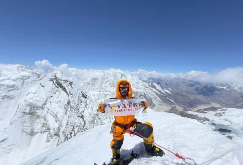 Mountaineer navigating high-altitude terrain—a visual nod to royalty and guide requirements.