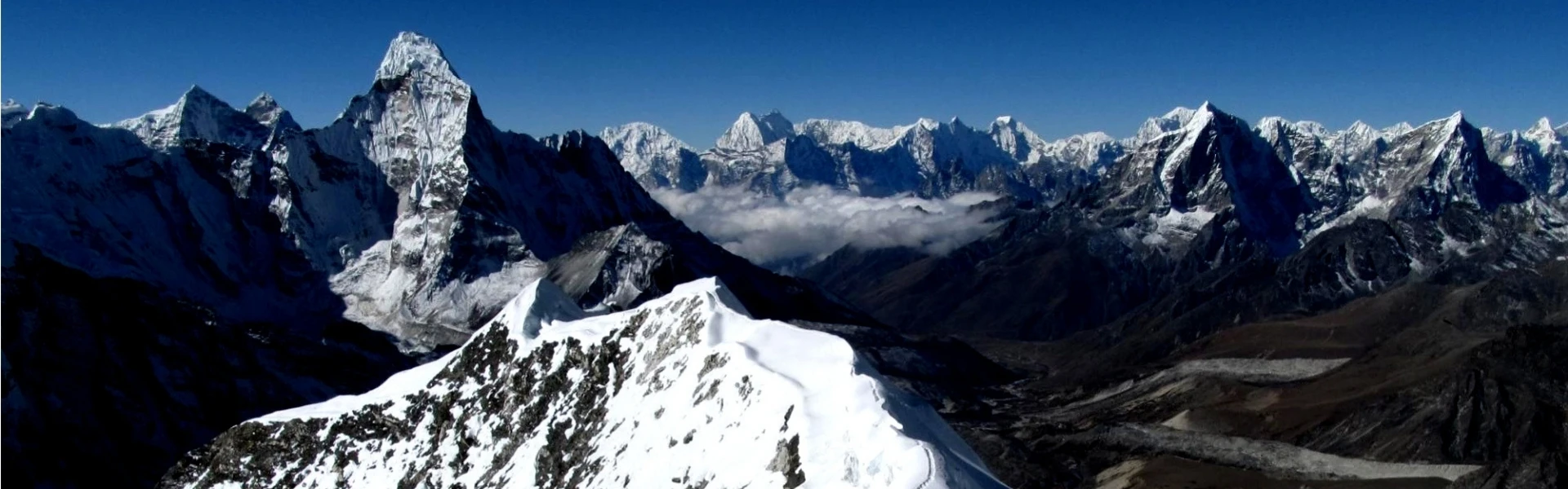 Climbers approaching a high-altitude 6000m peak in Nepal