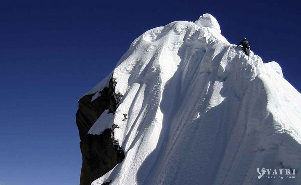 Climbers ascending Lobuche East Peak after visiting Everest Base Camp in the Khumbu region