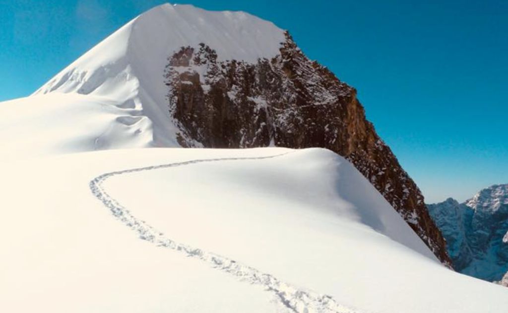 View of Tharpu Chuli Peak from Annapurna Base Camp surrounded by Annapurna South and Machapuchare