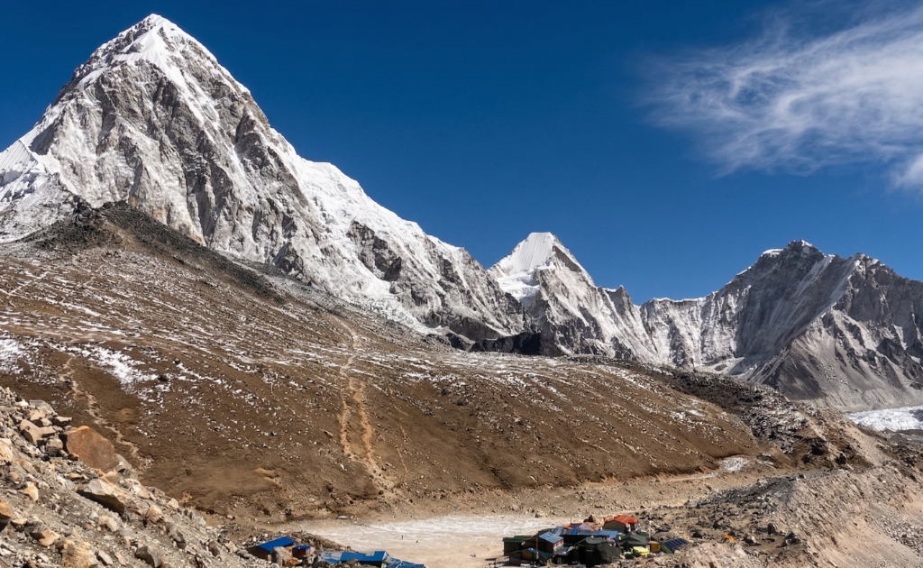 Pumori peak towering above Everest Base Camp with steep ridges and ice faces