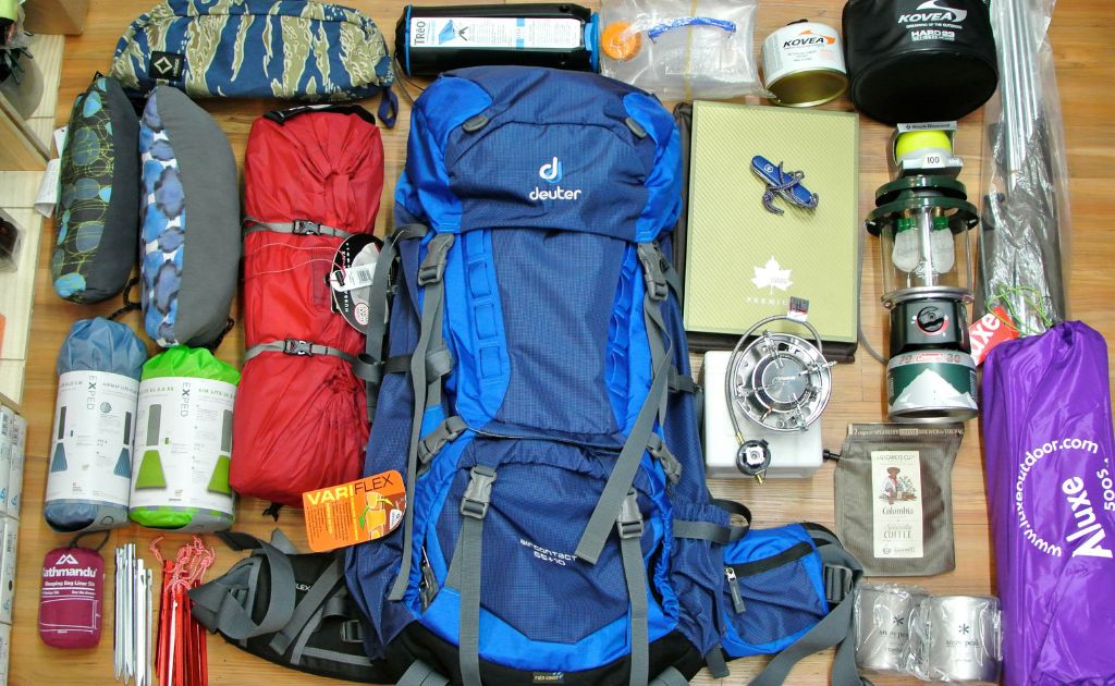 Trekking gear and backpack laid out for Annapurna Base Camp trek preparation