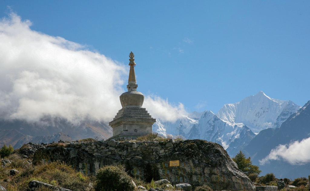 Kyanjin Gompa surrounded by the snow-capped peaks of Langtang Valley in Nepal.