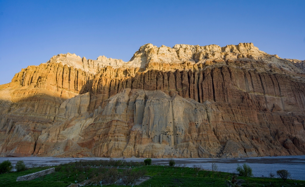 Sunny trekking trail in Upper Mustang during Nepal's monsoon season.