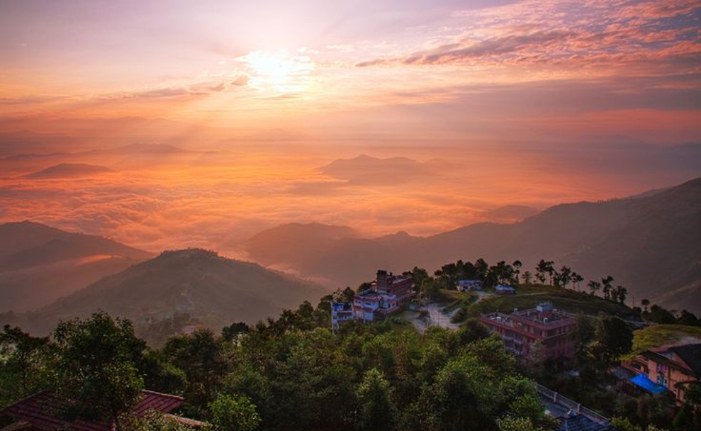 Sunrise view from Nagarkot with Himalayan range and soft morning light over hills near Kathmandu